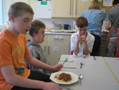 Senior pupils eating together